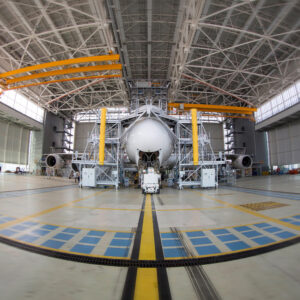 A fisheye picture of an Airbus 380 in a hangar